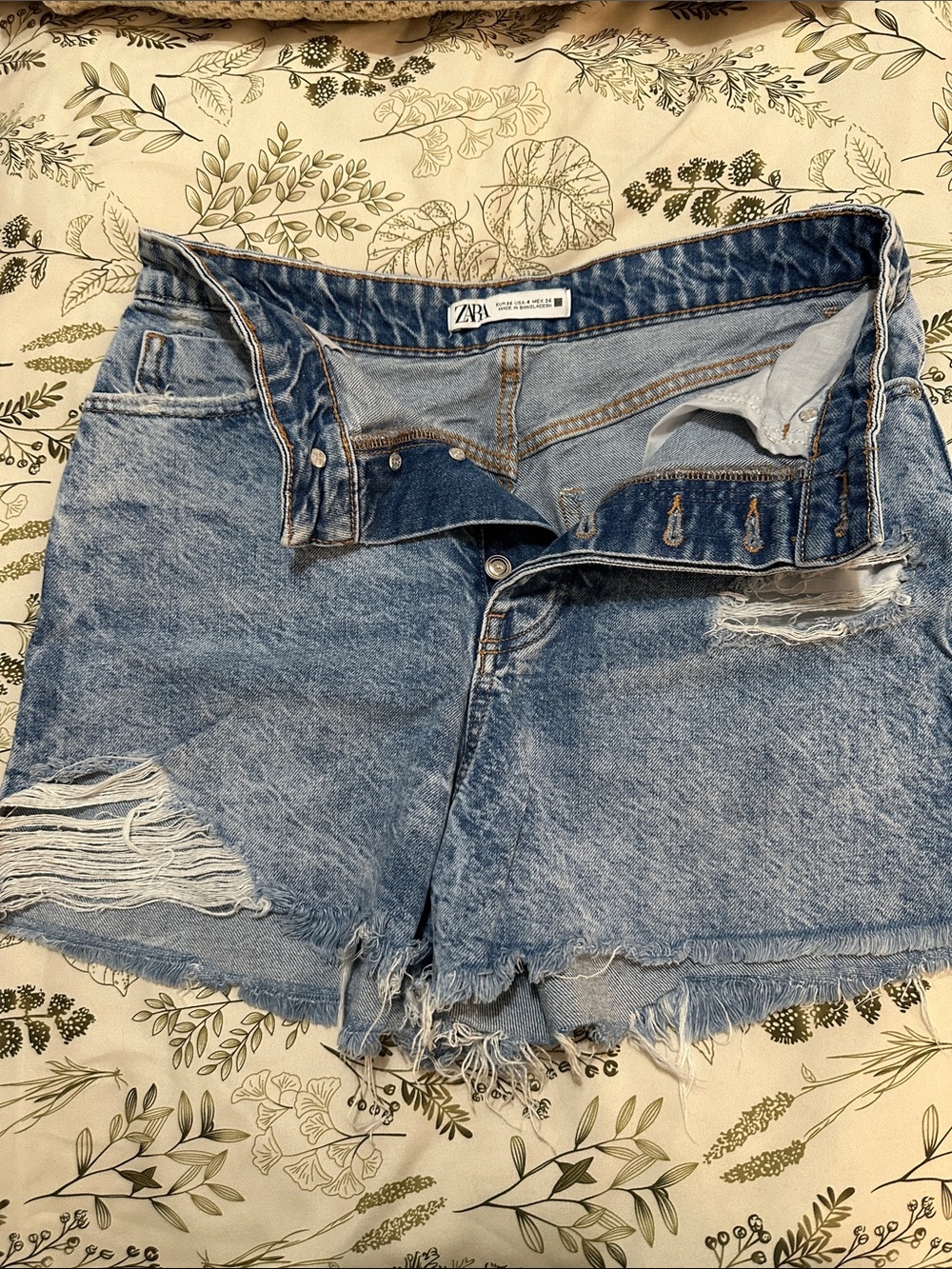 ZARA Distressed Light Blue Denim Cutoff Shorts